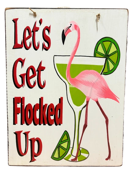 Decorative sign with a flamingo, cocktail, and lime slices and text 'Let's Get Flocked Up' on a white background.