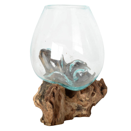 Glass bowl vase on driftwood