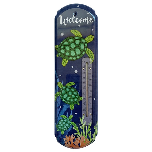 Decorative thermometer with turtle design on a white background