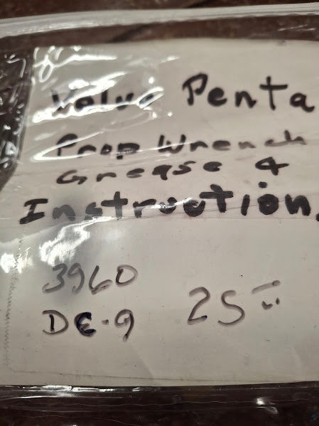 Packaged item with handwritten text on a clear label
